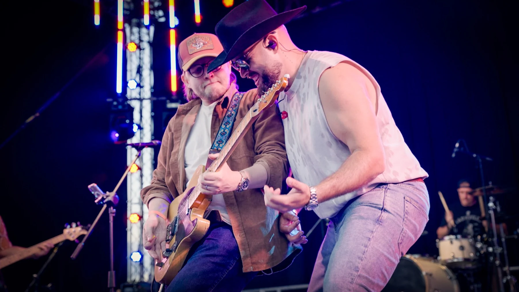 Next Stop Nashville vocalist and guitarist sharing the front of the stage